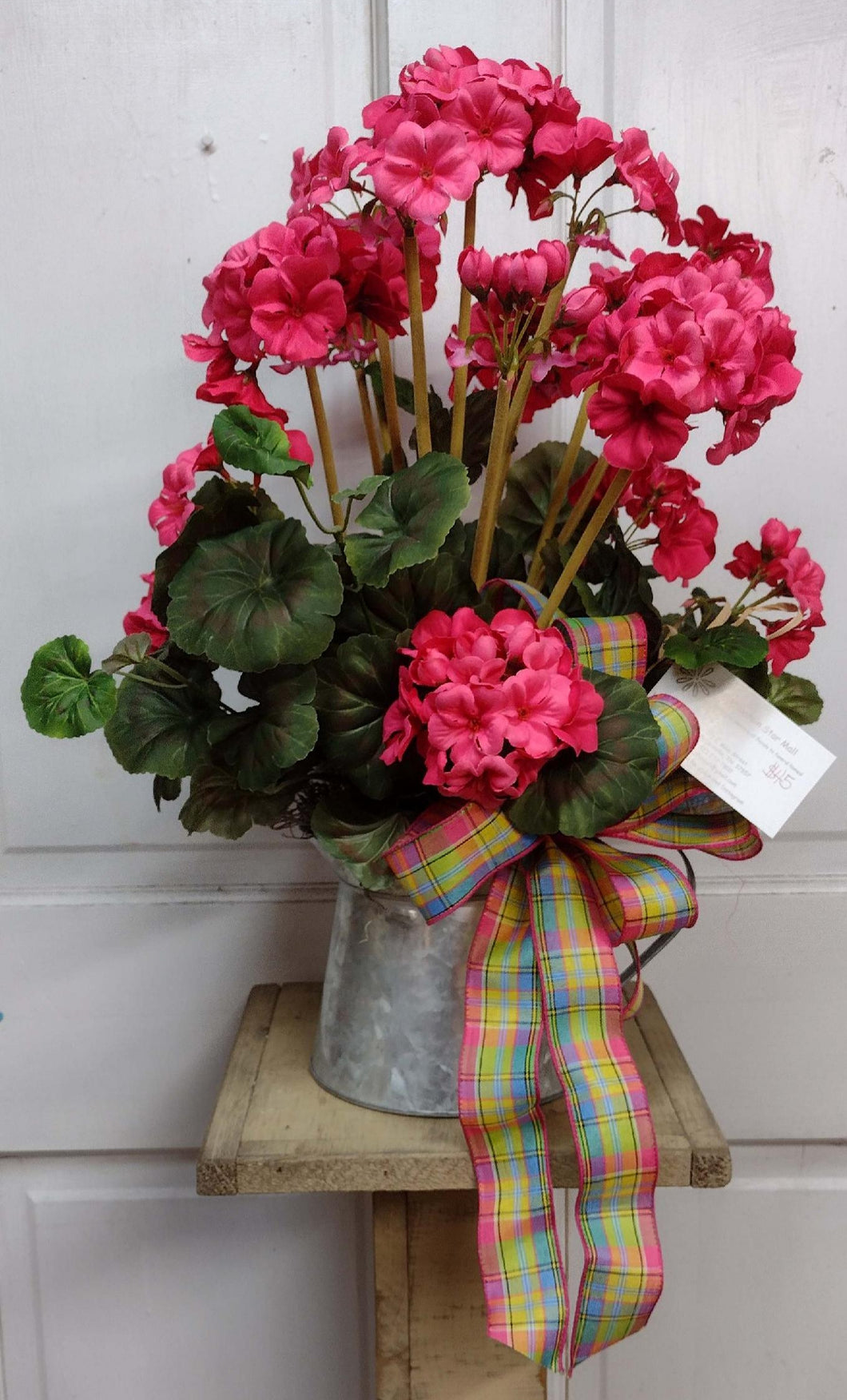 K420 - Water Can Arrangement with Pink Geraniums