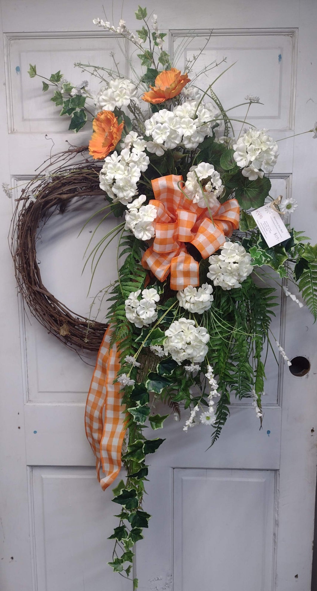 K490 - Huge Wreath with Orange and White Bow