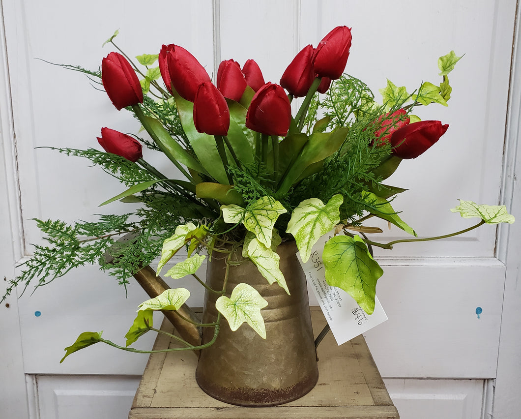 K351 - Water Can Arrangement with Red Tulips